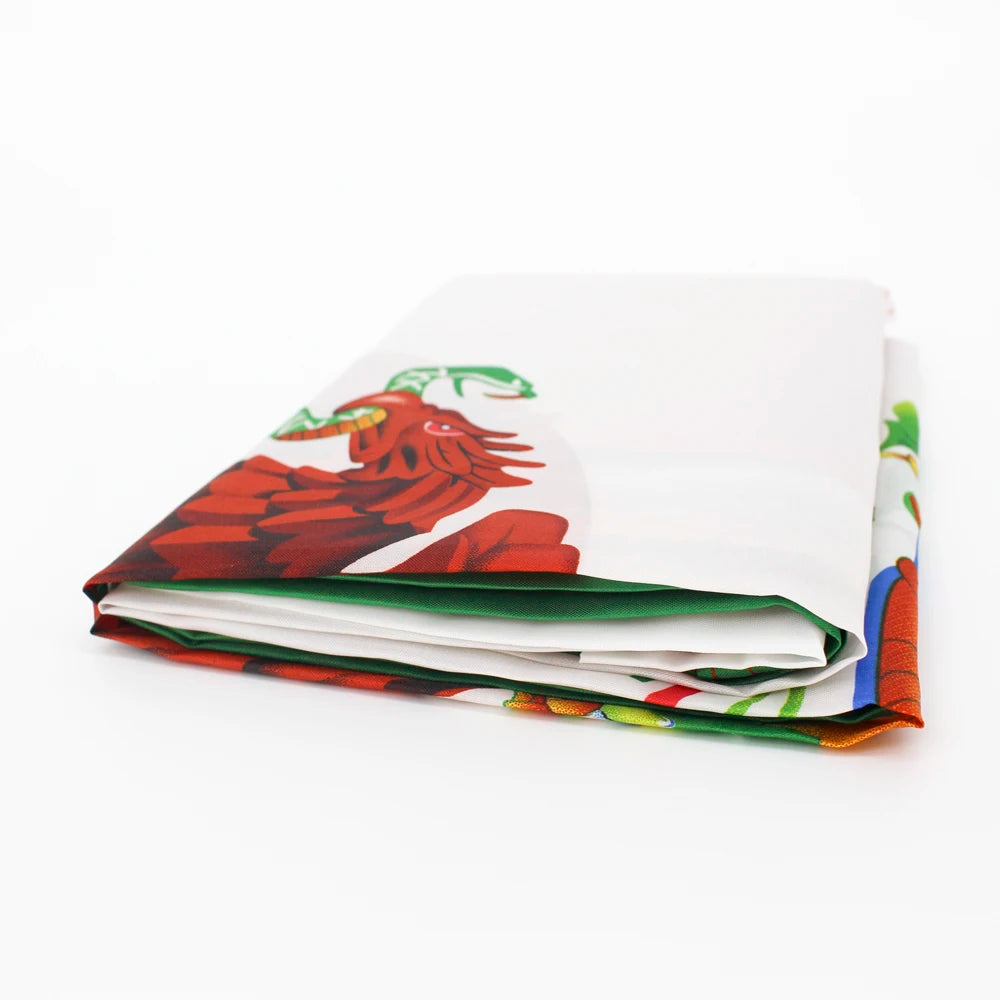 A stack of fabric featuring a large outdoor Mexico nation flag decoration in red, green, and white.