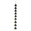 A vertical arrangement of small vintage metal wind chimes hanging from a chain.