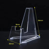 Clear acrylic display stand with measurements indicating its dimensions.