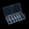 A transparent nail art organizer storage box with a hinged lid and multiple compartments.