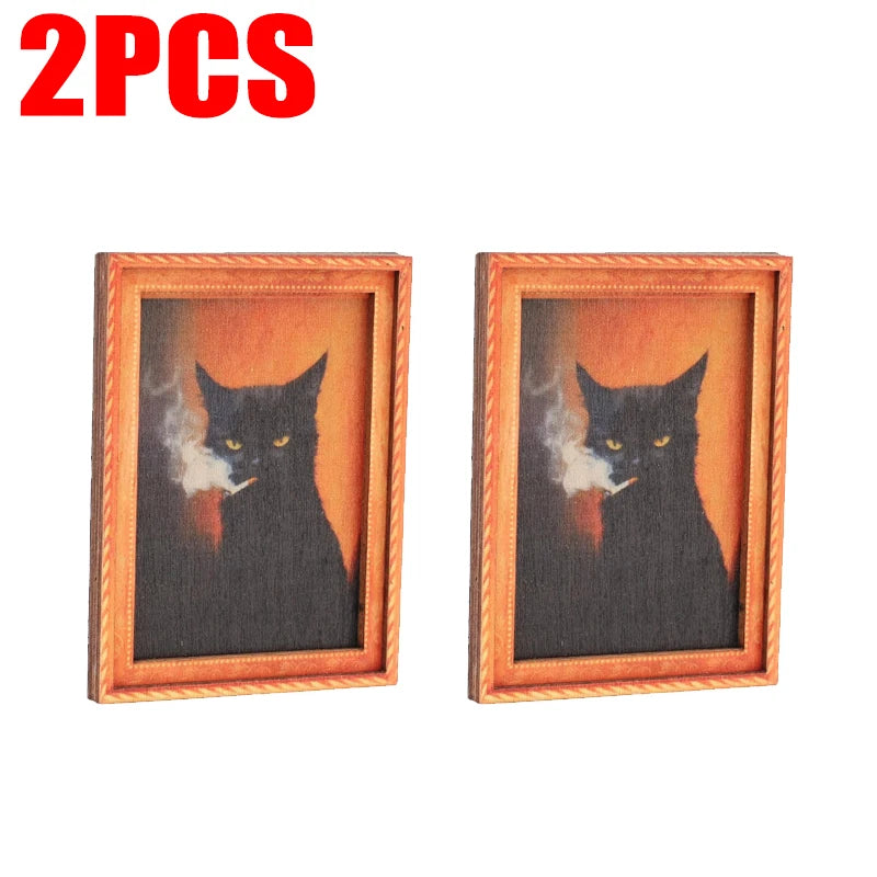 Zwei gerahmte Drucke einer schwarzen Katzen-Silhouette vor orangefarbiger Hintergrund für Home Decor