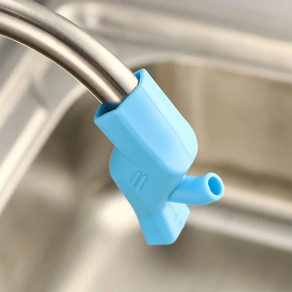 A light blue flexible silicone faucet extender attached to a metal faucet, used for easy washing.