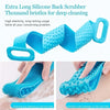 A blue silicone back scrubber with thousand bristles is shown being used for exfoliation and massage on the back side of the 