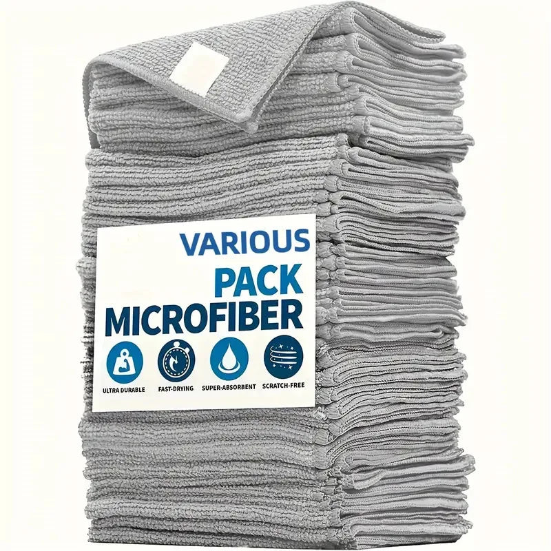 A stack of gray reusable microfiber cleaning cloths with various features listed on the packaging.