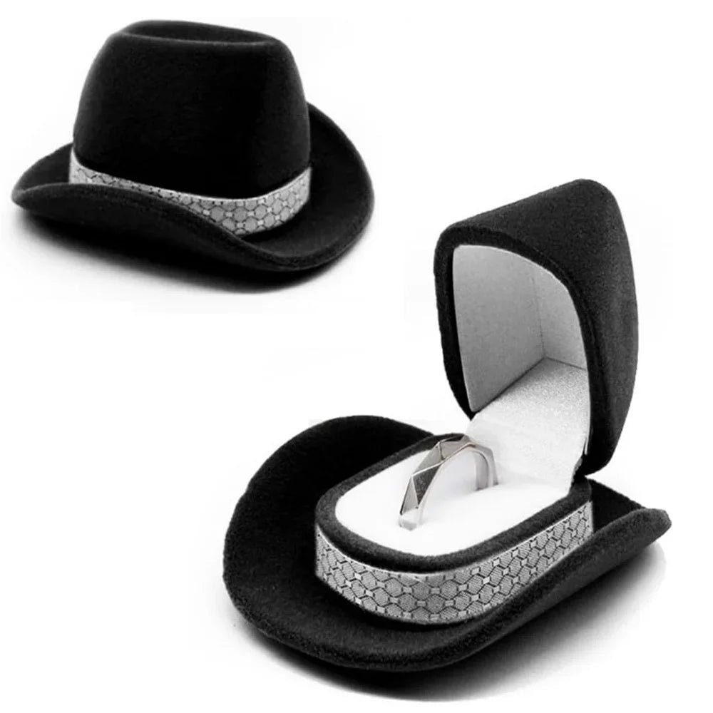 Black velvet cowboy hat jewelry storage box with a silver hat insert and band