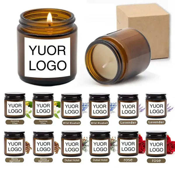 A collection of small glass jars containing various scents labeled Yuor Logo including Jasmine, Wild Bluebell, Lavender, and 