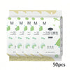 A set of 50 disposable toilet seat covers in green and white packaging.