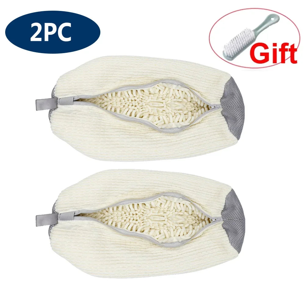 Two reusable white shoe cleaning bags with mesh interiors and gray trim, packaged as a gift.