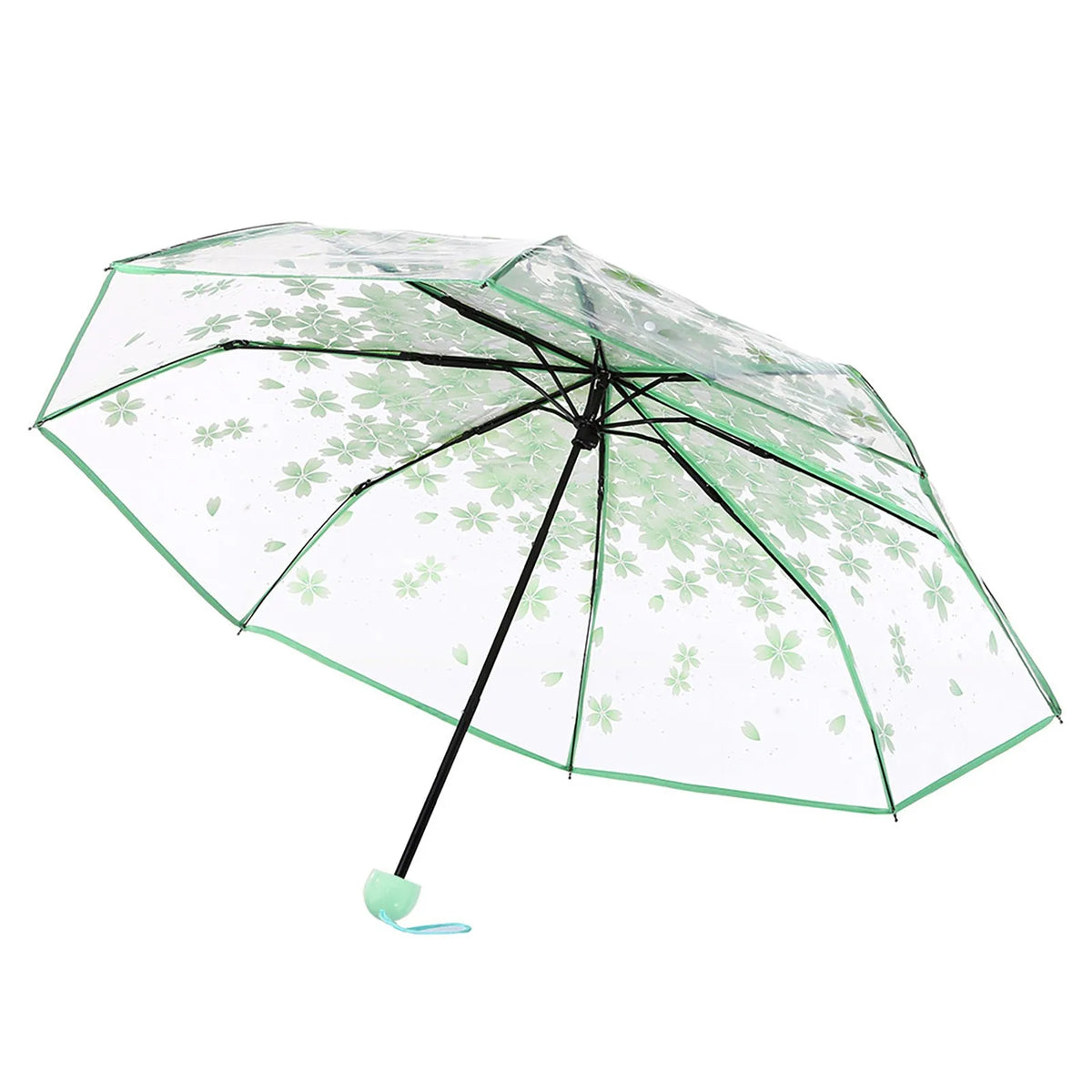 Ein klarer Regenschirm mit Blumenmuster, geöffnet und schräg vor weißem Hintergrund.