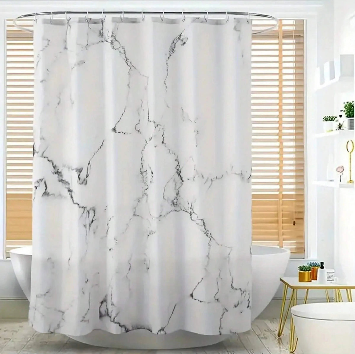 White shower curtain with black marble veining hanging in a bathroom