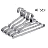 40 pieces of silver-colored metal clips or hangers for organizing items.