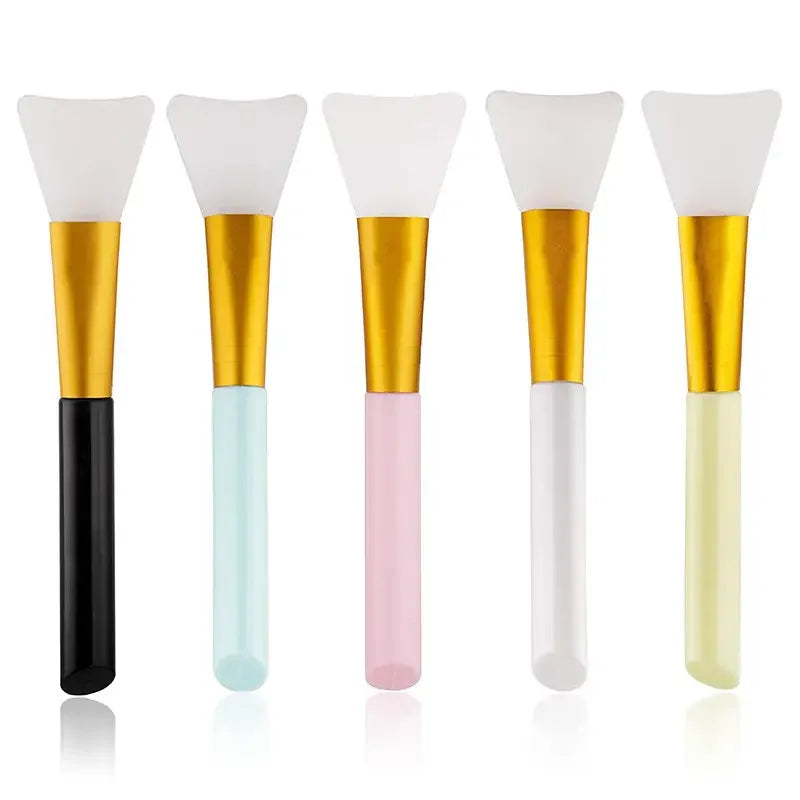 A set of six silicone facial mask brushes in various pastel colors, including white, light blue, pink, and yellow.