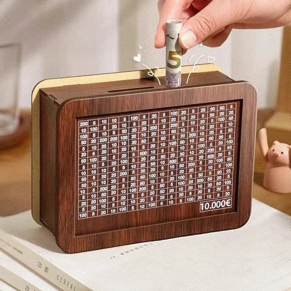 A hand places a coin into a wooden piggy bank marked with various savings amounts.