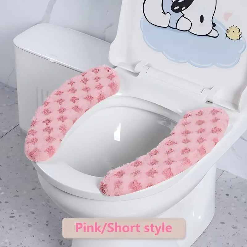Pink short style toilet seat cushion cover on a white toilet bowl