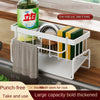 A white kitchen drain rack holds a green bottle and a yellow block, designed for multi-use.