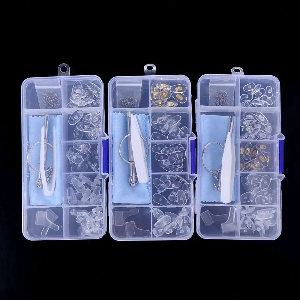 A clear plastic kit for precision glasses repair containing various tools and a screwdriver.