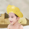 A yellow adjustable baby bath shampoo shield cap is shown on a child, with icons indicating safety and features.