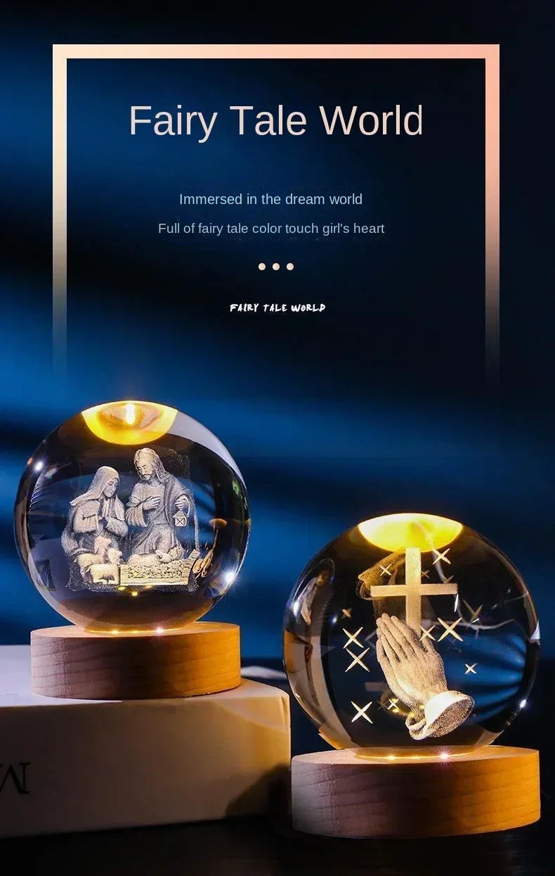 A set of illuminated crystal balls resting on wooden bases, featuring scenes and a cross.