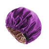 A purple satin sleep cap with a gathered edge, designed for curly and natural hair.