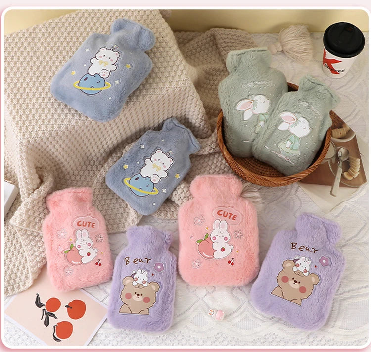 A collection of plush cartoon hot water bottles featuring animals like a cat, rabbit, and bear in various pastel colors.