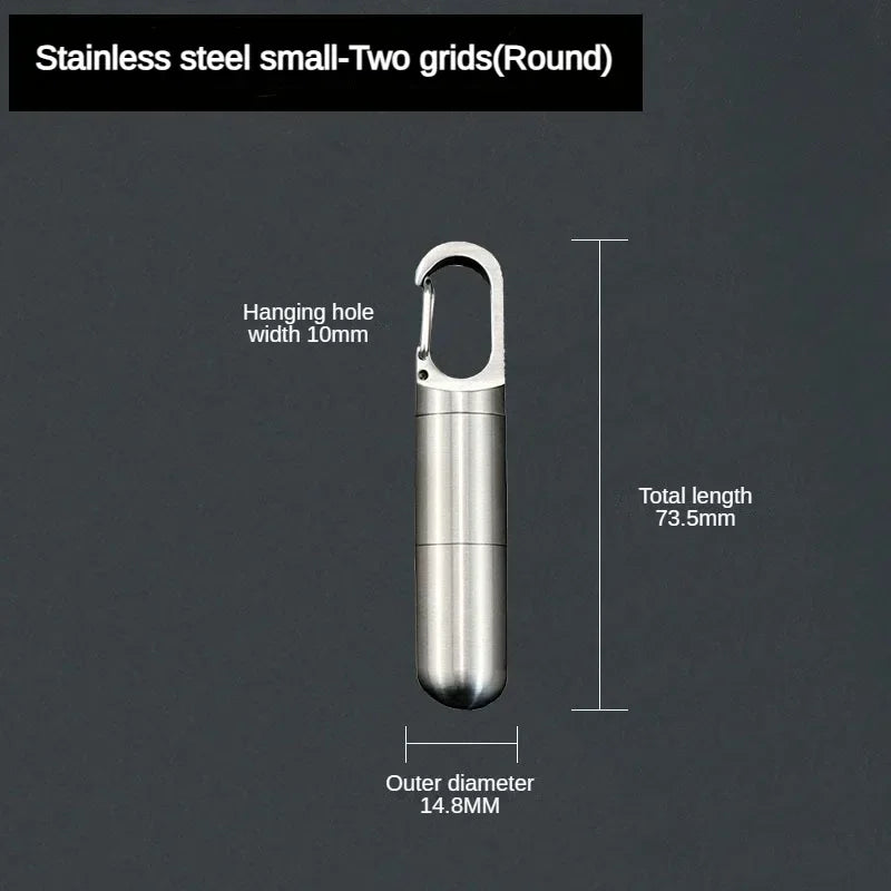 A stainless steel hanging pill box with two round grids, showing its dimensions and design.