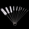 A set of ten nylon bottle and straw cleaning brushes arranged radially against a black background.