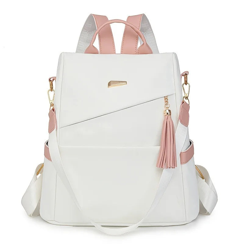 A white women's anti-theft PU leather travel backpack with pink accents and light gray straps.