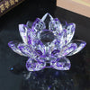 A clear purple crystal lotus flower centerpiece used as tabletop decor.