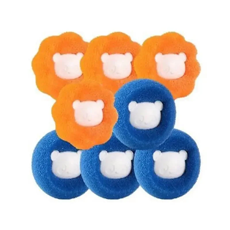 A set of reusable pet hair catcher laundry balls in orange and blue with white ears.