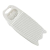 A white thickened washboard for delicate laundry with a wavy section and a textured surface.