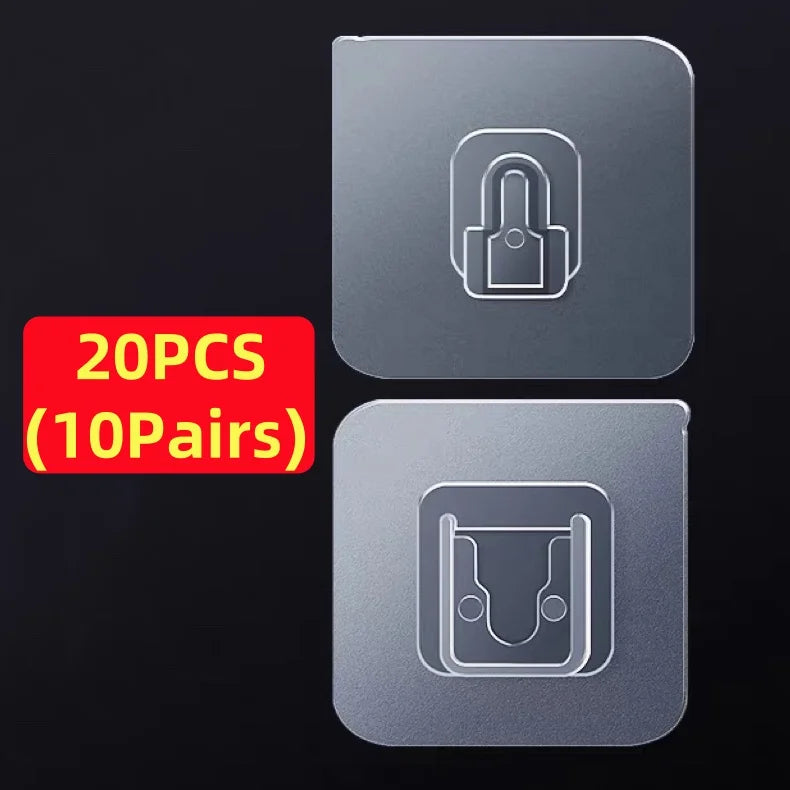 Two silver double-sided adhesive wall hooks are shown against a black background.