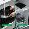 A silicone drain mat is shown being used to drain water in a kitchen sink, highlighting its easy cleaning and dishwasher safe