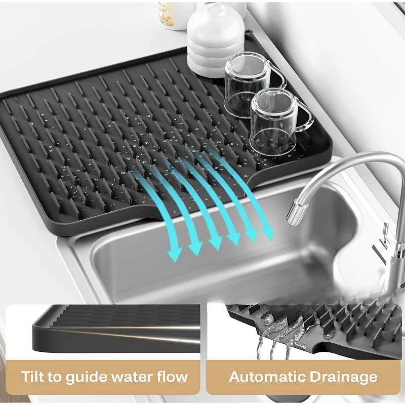 Silicone dish drying mat with raised drainage ridges shown in a kitchen sink