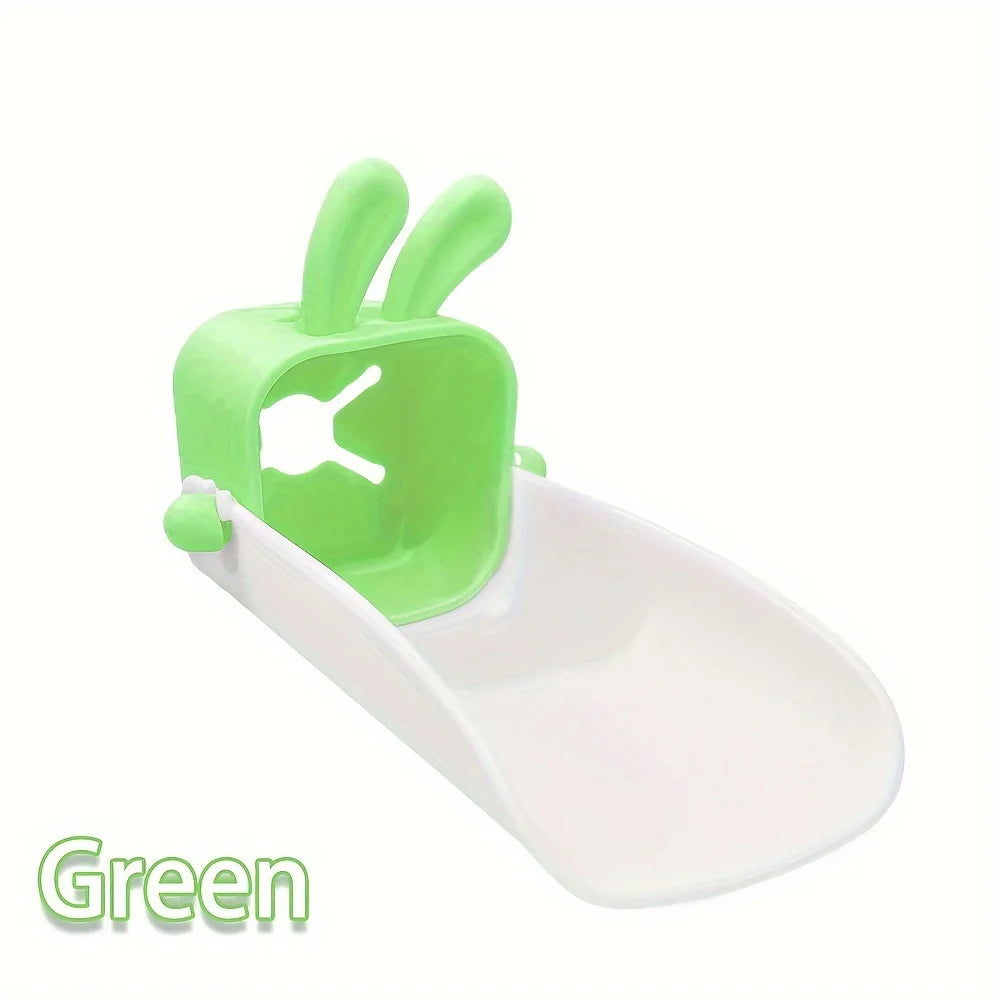 A green anti-splash faucet extender with a cute rabbit design.