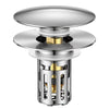 Silberner Waschbeckenabflussfilter mit abnehmbarem Maschenaufsatz und poliertem Metalldeckel.