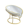 A decorative leaf-shaped soap dish with a white ceramic bowl and gold trim on a metal stand.