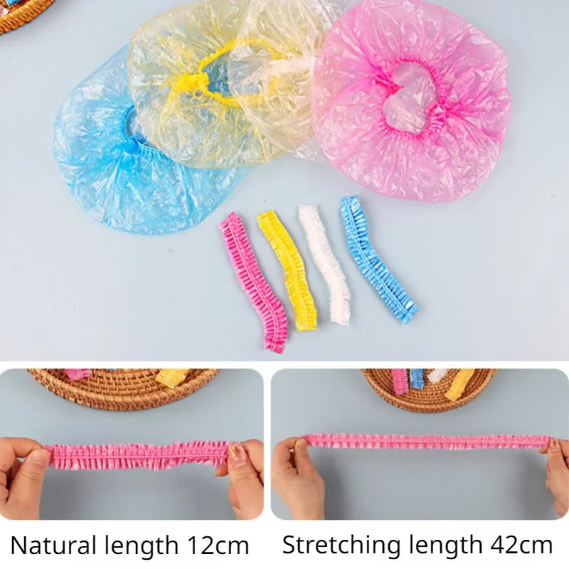 Colorful reusable transparent shower caps and elastic hair ties shown with their natural and stretching lengths.