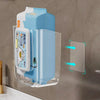 A light blue wall-mounted dispenser for tissue and wipes is shown mounted on a gray wall.