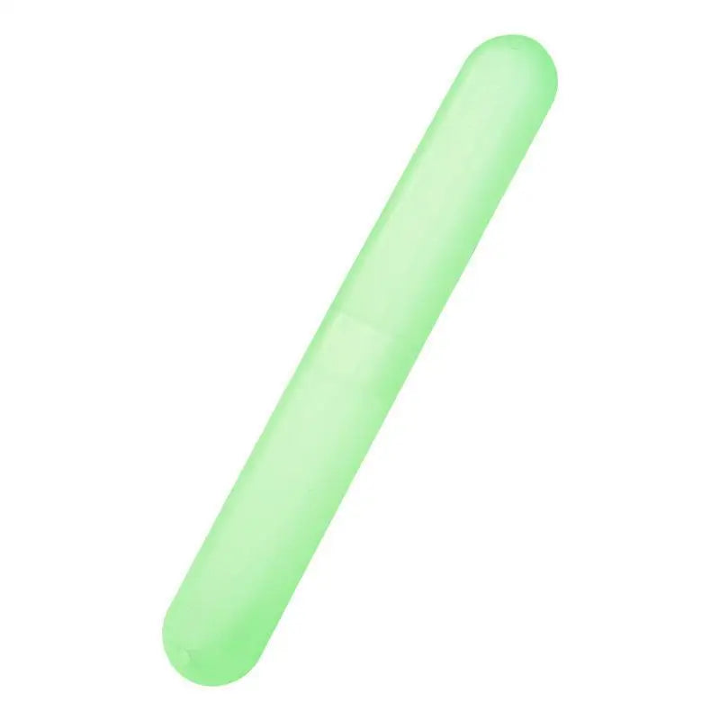 A light green, cylindrical portable toothbrush storage case viewed at an angle.