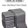 Five thin gray microfiber cleaning cloths stacked and folded.
