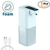 A white touchless electric soap dispenser with a black dispensing nozzle and power cord.