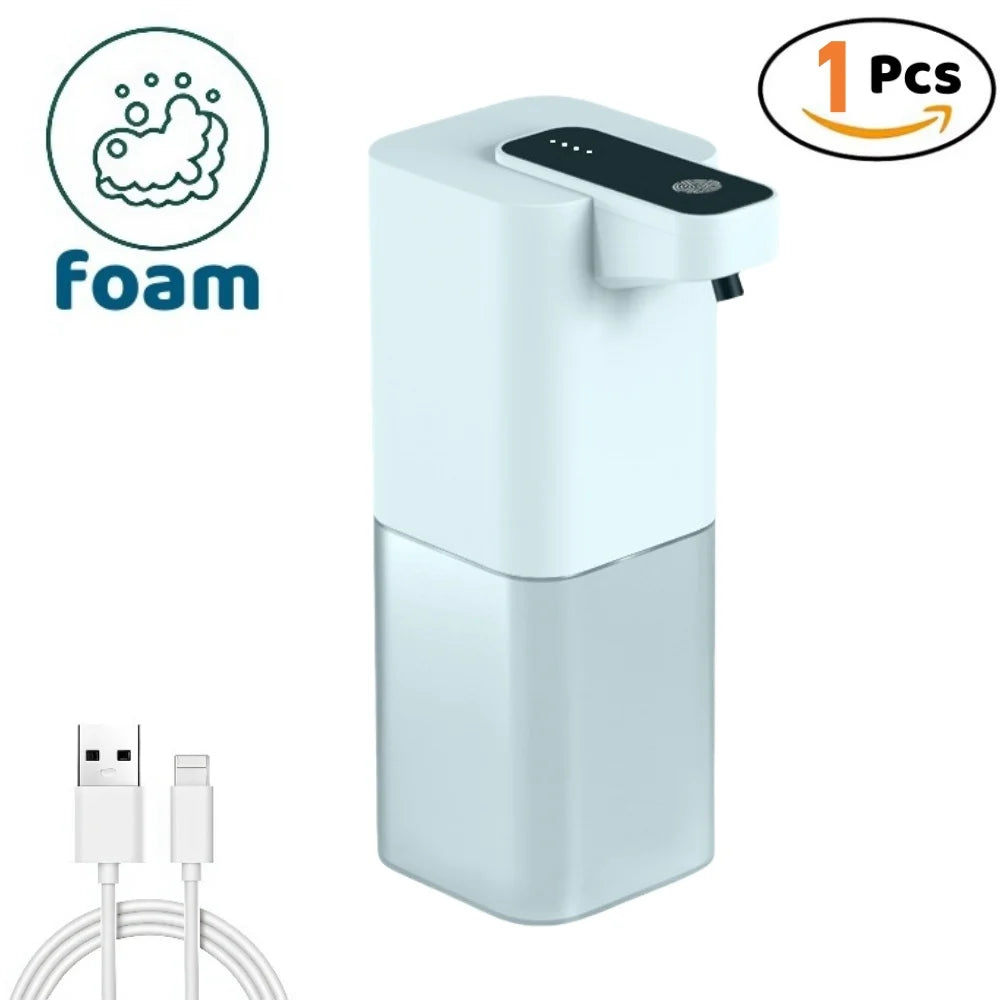 A white touchless electric soap dispenser with a black dispensing nozzle and power cord.