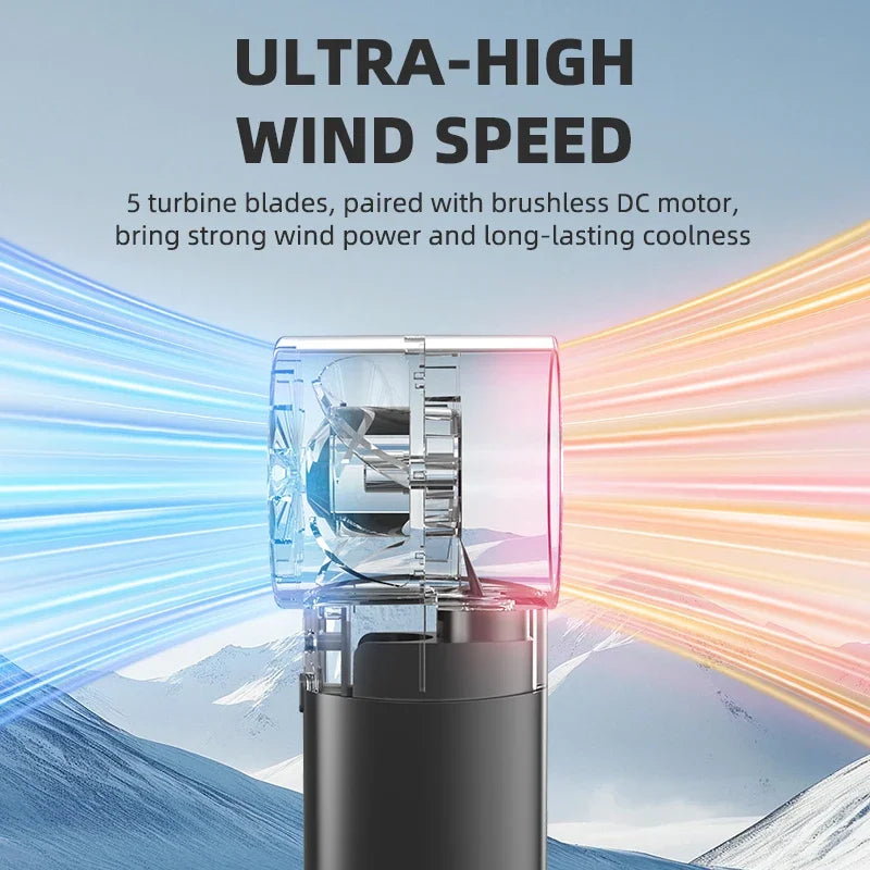 A portable handheld cooling fan with a clear blade and black body is shown against a snowy mountain background.