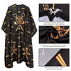 Black professional salon hair cutting cape featuring gold embroidery and an adjustable neck steel buckle.