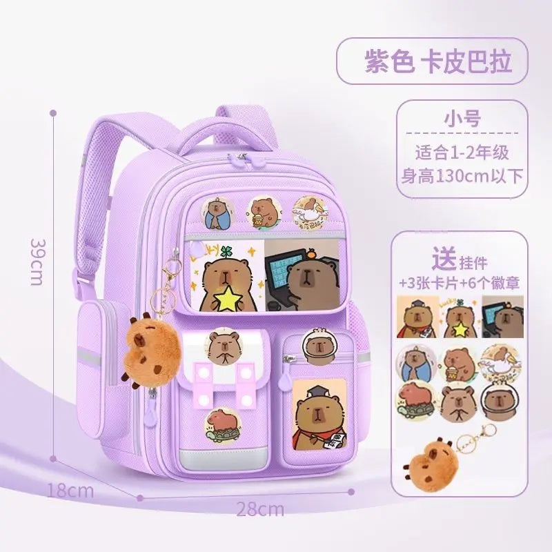 A purple school backpack featuring a capybara design with various cute animal charms and accessories.