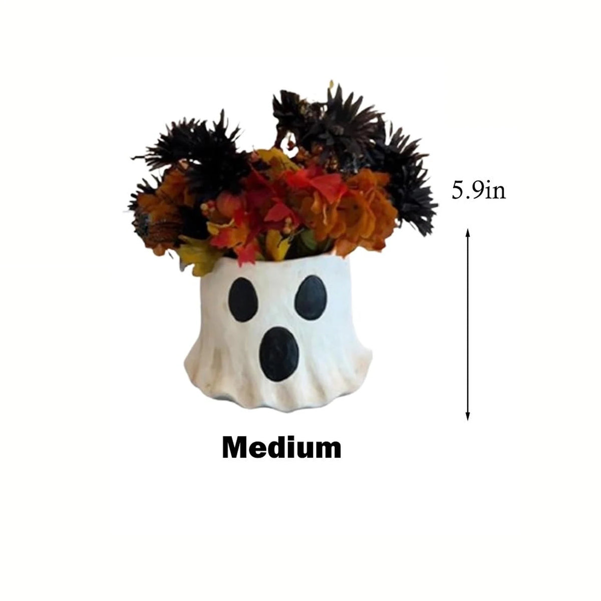 Vase fantôme en céramique avec des yeux noirs et un arrangement floral d'automne.