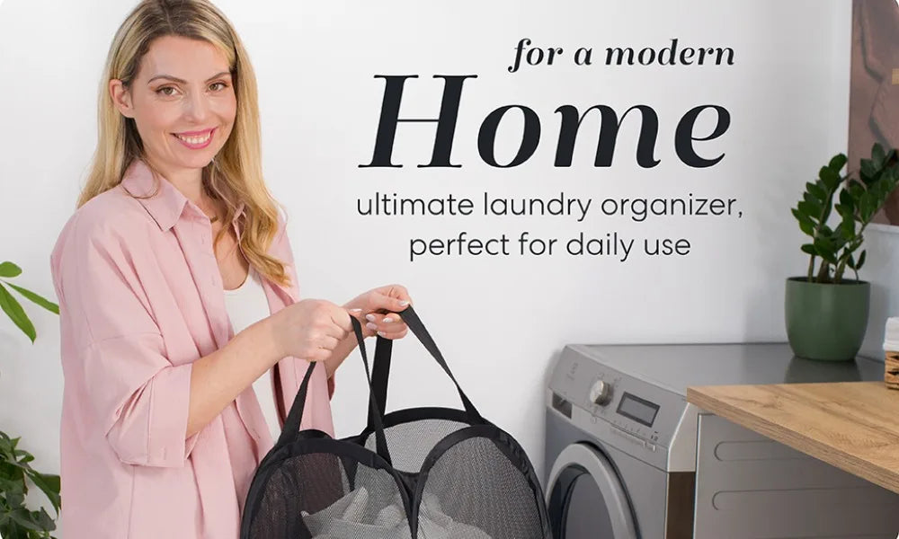 A woman holds a black mesh laundry basket organizer next to a washing machine in a modern home setting.