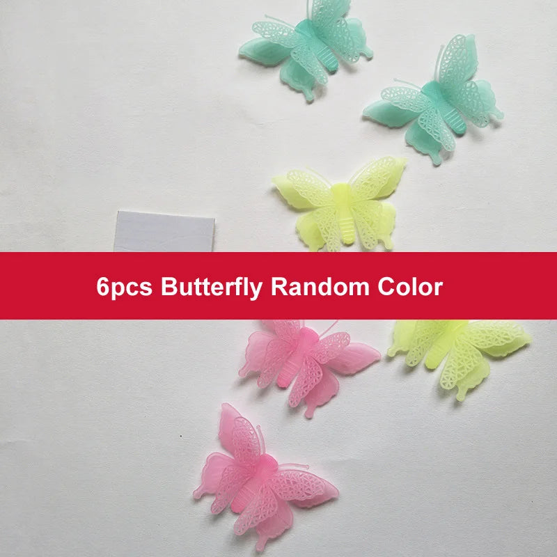 Six pieces of glow in the dark 3D butterfly wall decals in various colors including teal, light green, and pink.