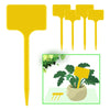 A set of yellow T-shaped plant markers for indoor or outdoor gardening, with one marker shown in a potted plant.