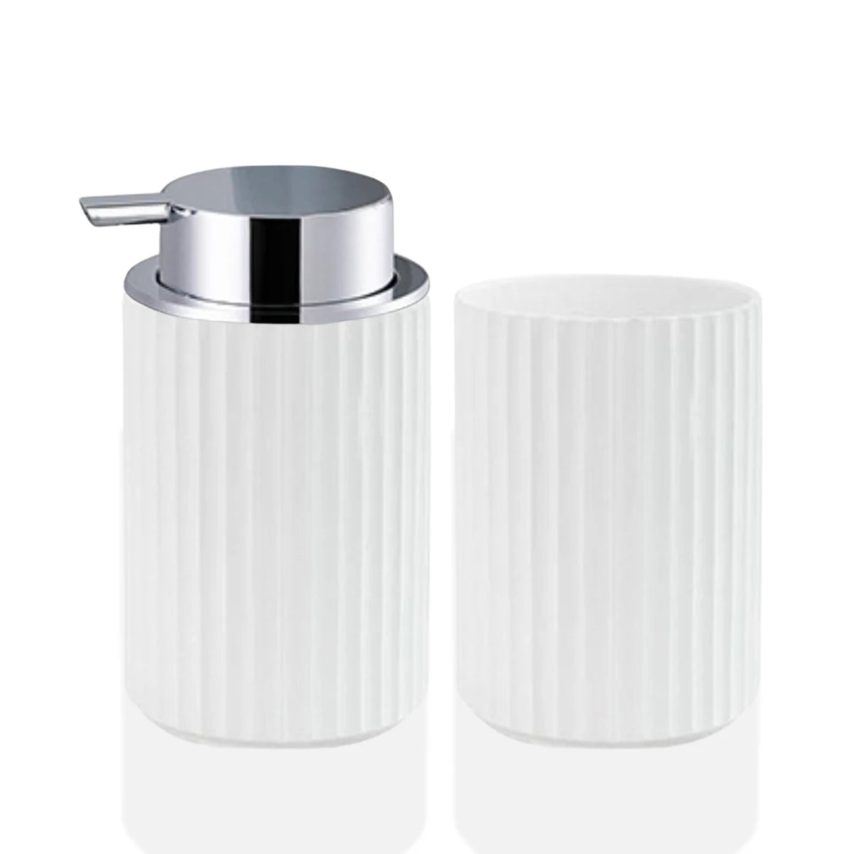 A white ceramic foaming soap dispenser with a silver pump and a toothbrush holder.
